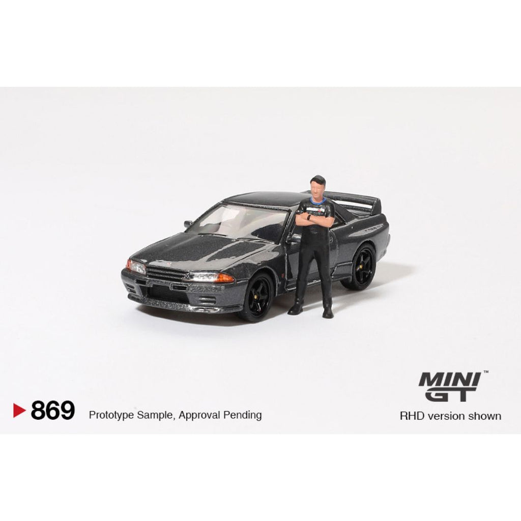 *EN CAMINO* Mini GT Nissan Skyline GT-R (R32) Gunmetal W/ Matsuda Figure - 869